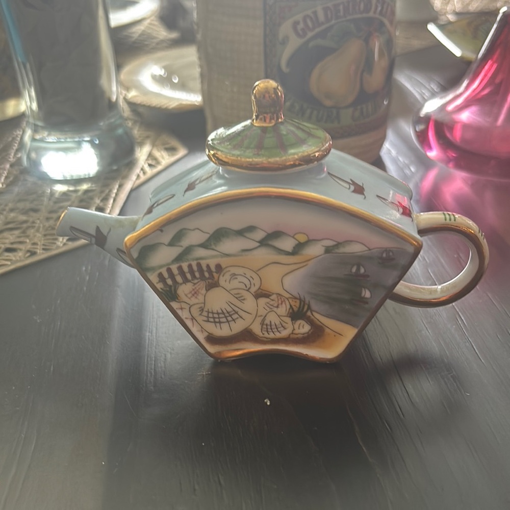 Artistic Ceramic Teapot with Scenic Design